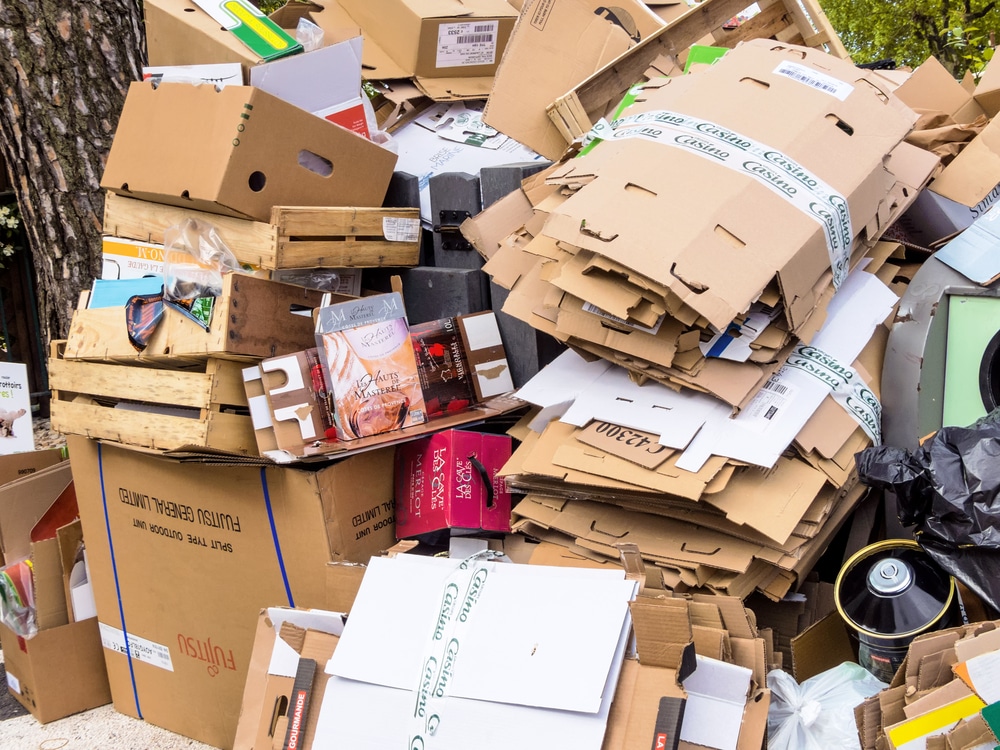 Mountains,Of,Cardboard,On,The,Street.,Of,Packaging,Waste,Paper